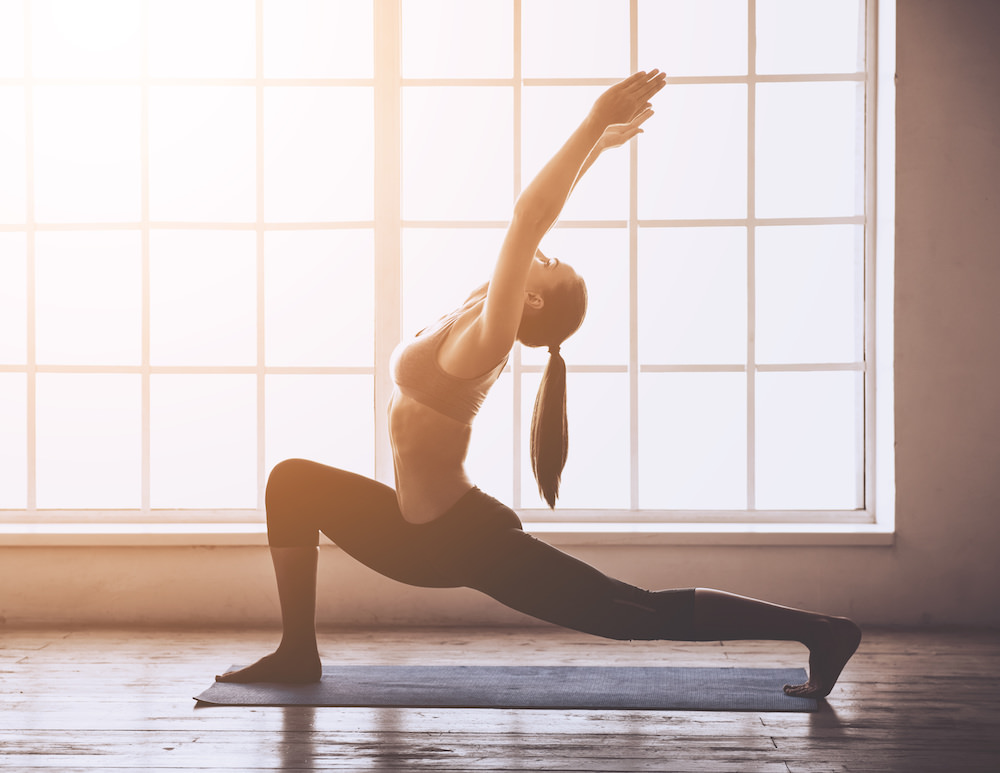 4300871 Young woman doing yoga